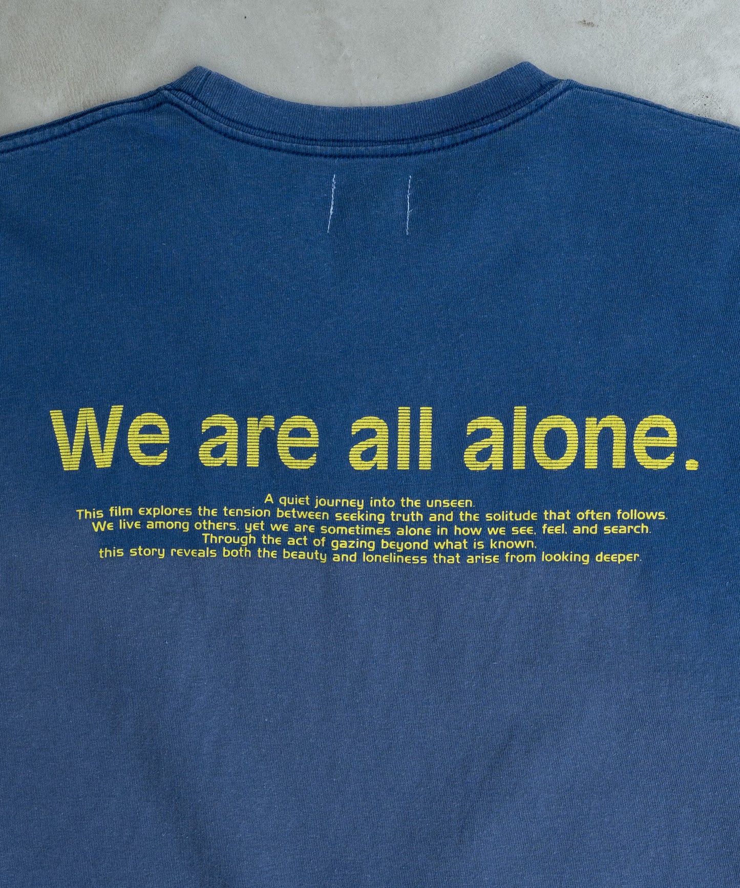 LOOSE FIT PRINT TEE :  WE ARE ALL ALONE