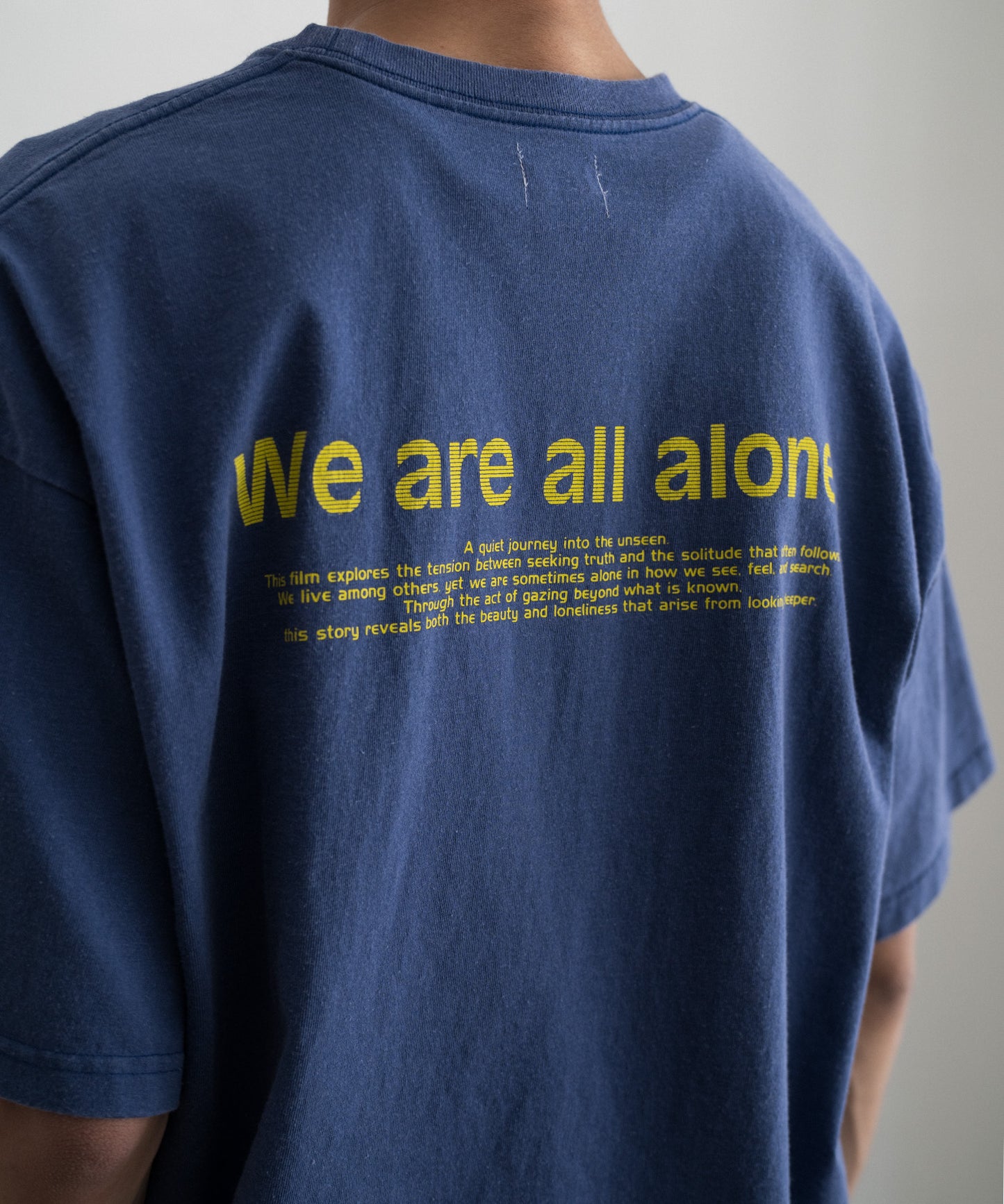 LOOSE FIT PRINT TEE :  WE ARE ALL ALONE
