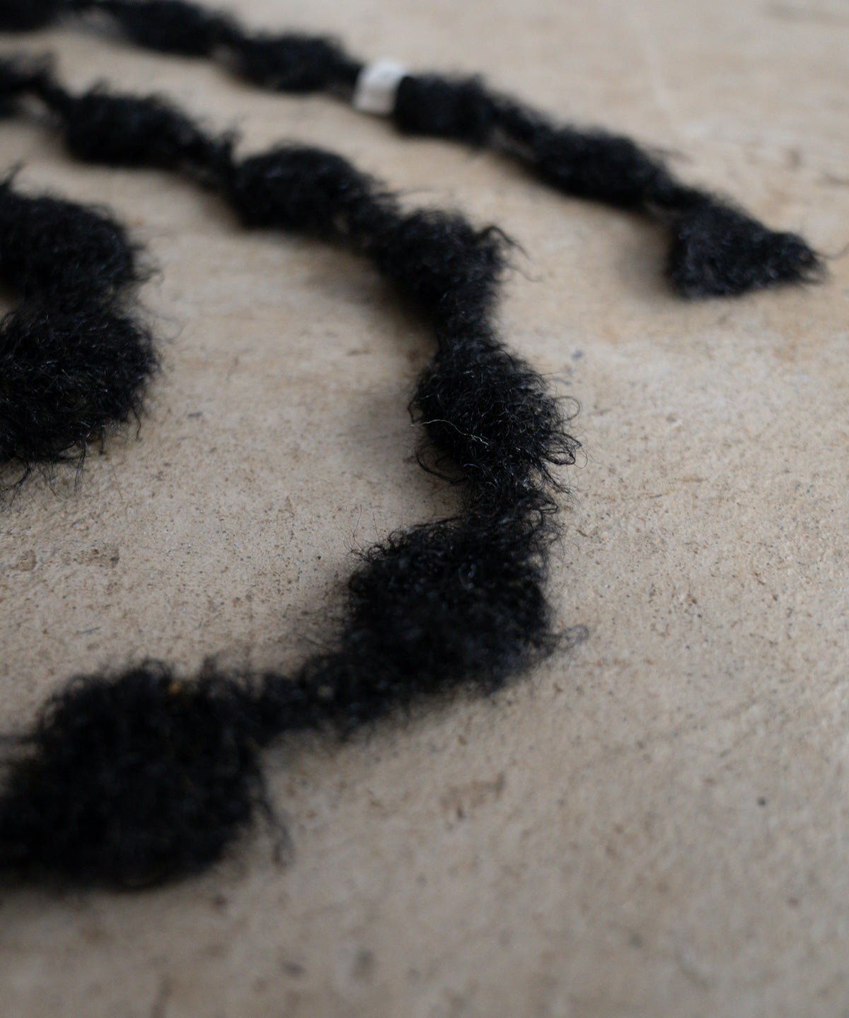 手編みマフラー