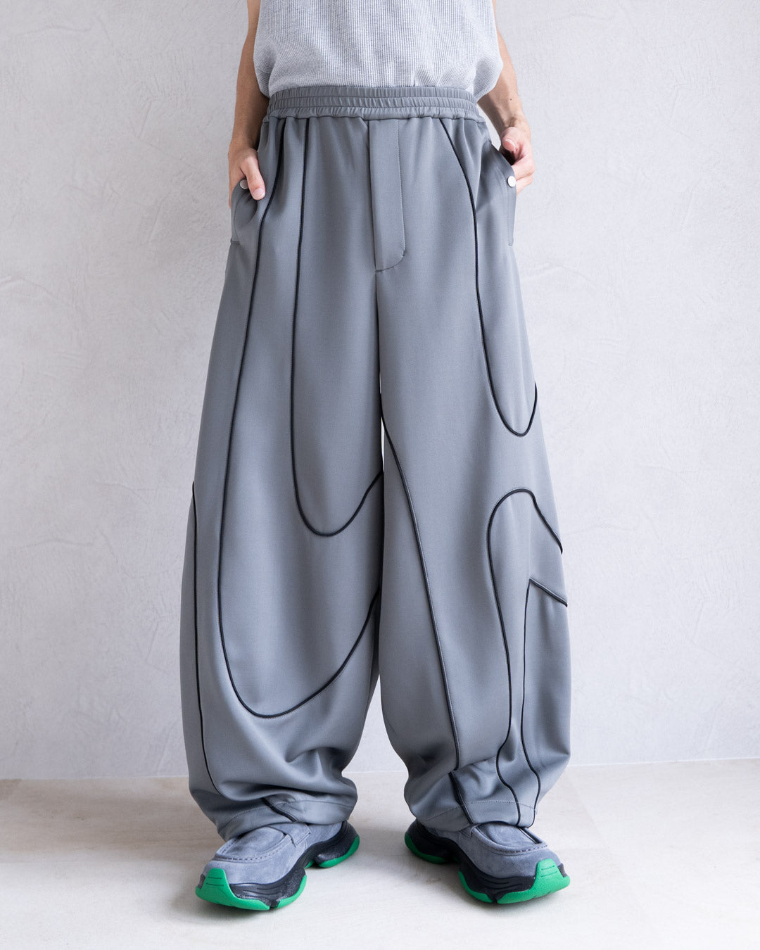DISTORT PIPING TRACK PANTS