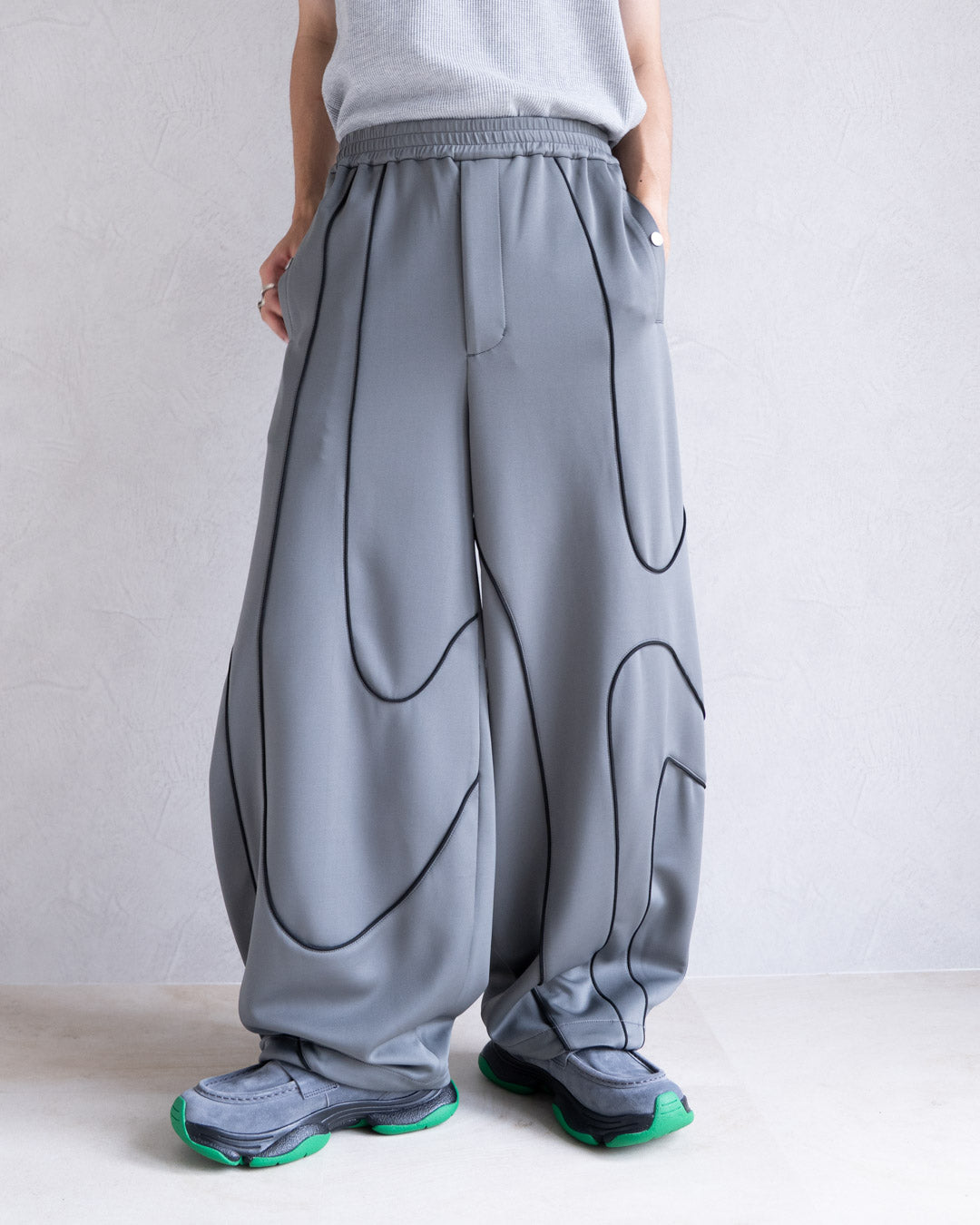 DISTORT PIPING TRACK PANTS