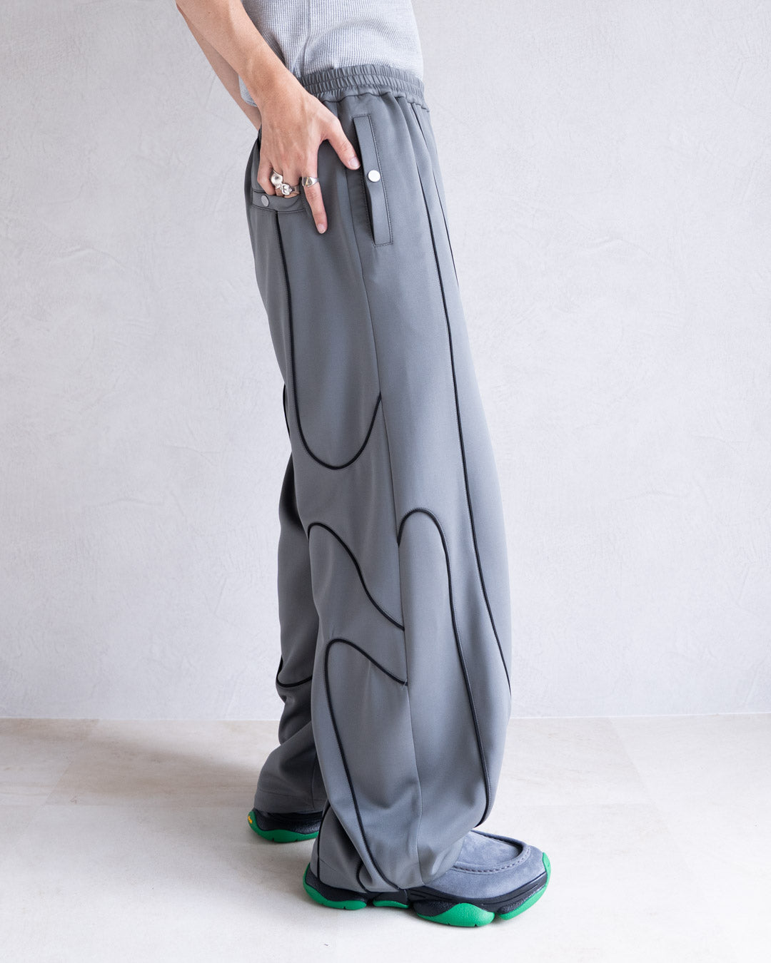 DISTORT PIPING TRACK PANTS